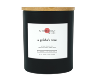 A Geisha's Rose soy candle with fresh cut rose and amber musk notes